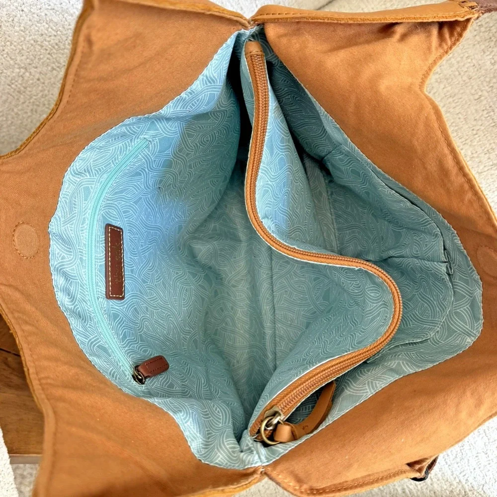 The Sak Women's Huntley‎ Leather Hobo Bag Metro Sling Pebbled Tan with Tassel
